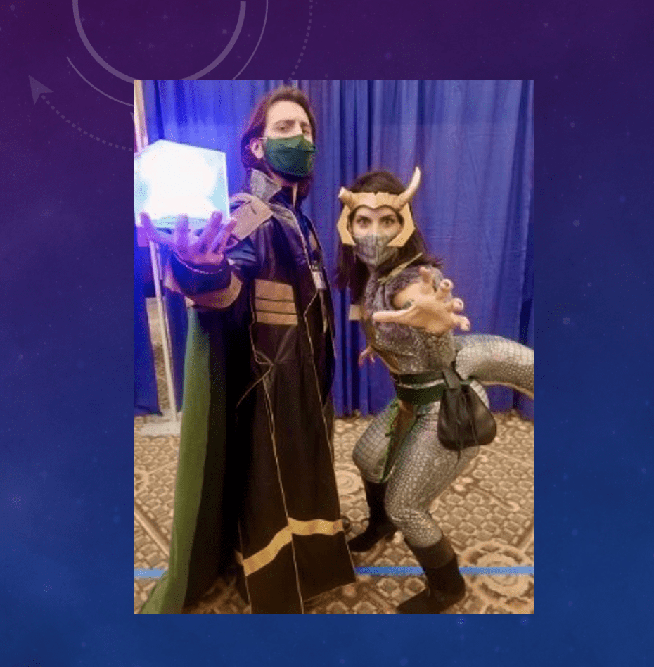 A man and a woman dressed up as thor and loki.