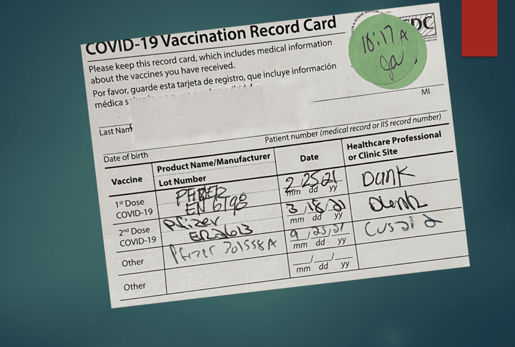 Covid-19 vaccination record card.