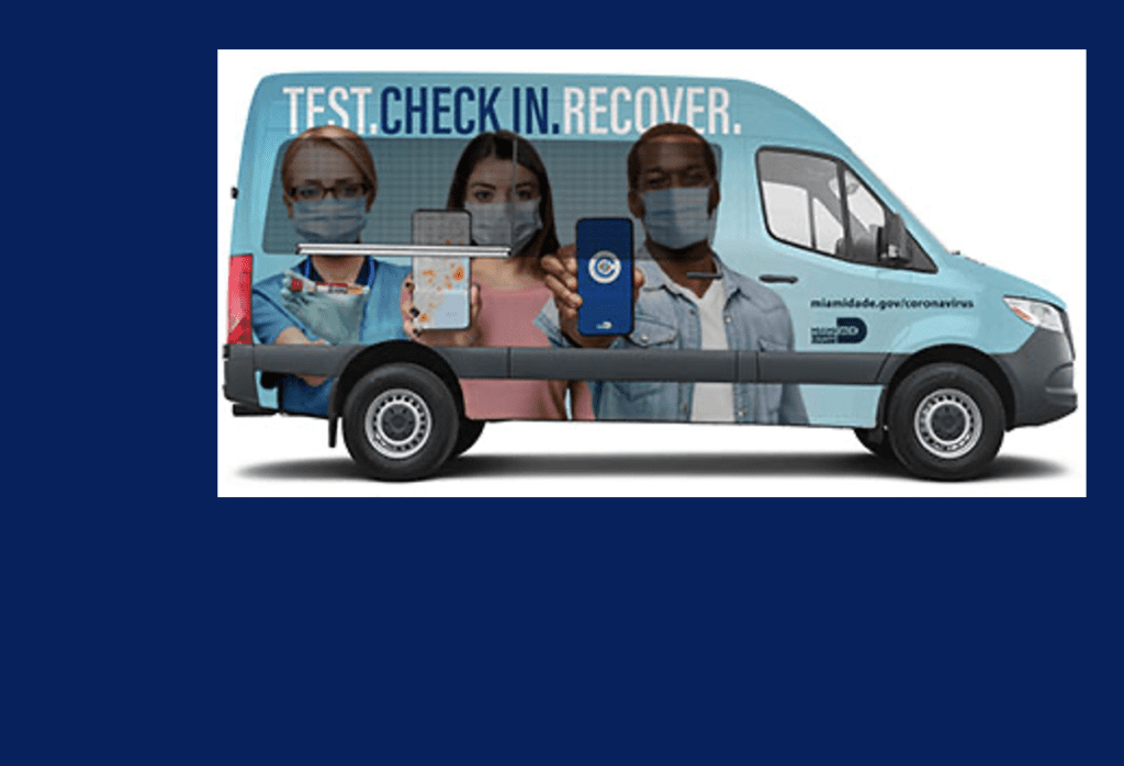 A blue van with the words test check in recovery.