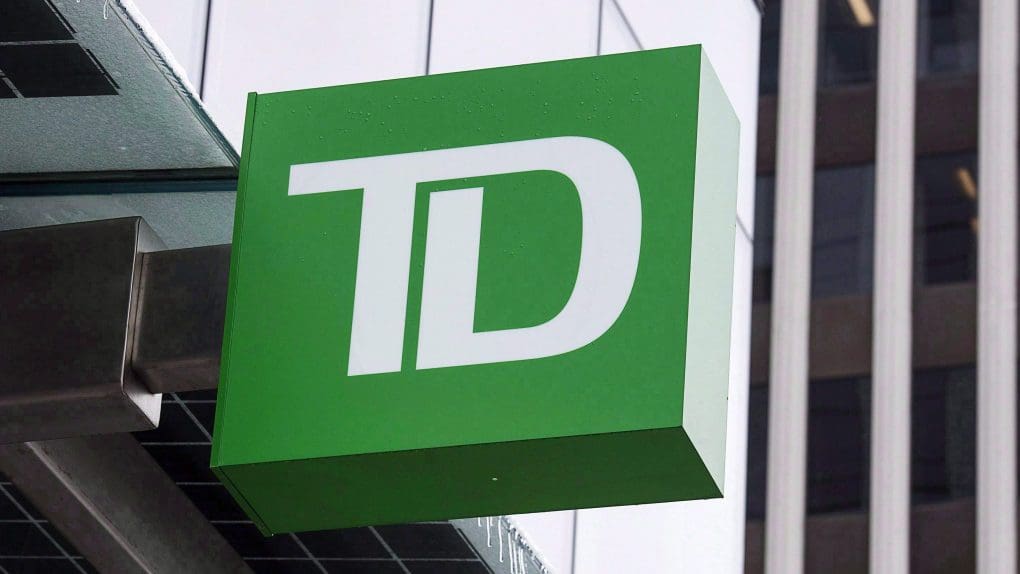 A green td sign is on the side of a building.