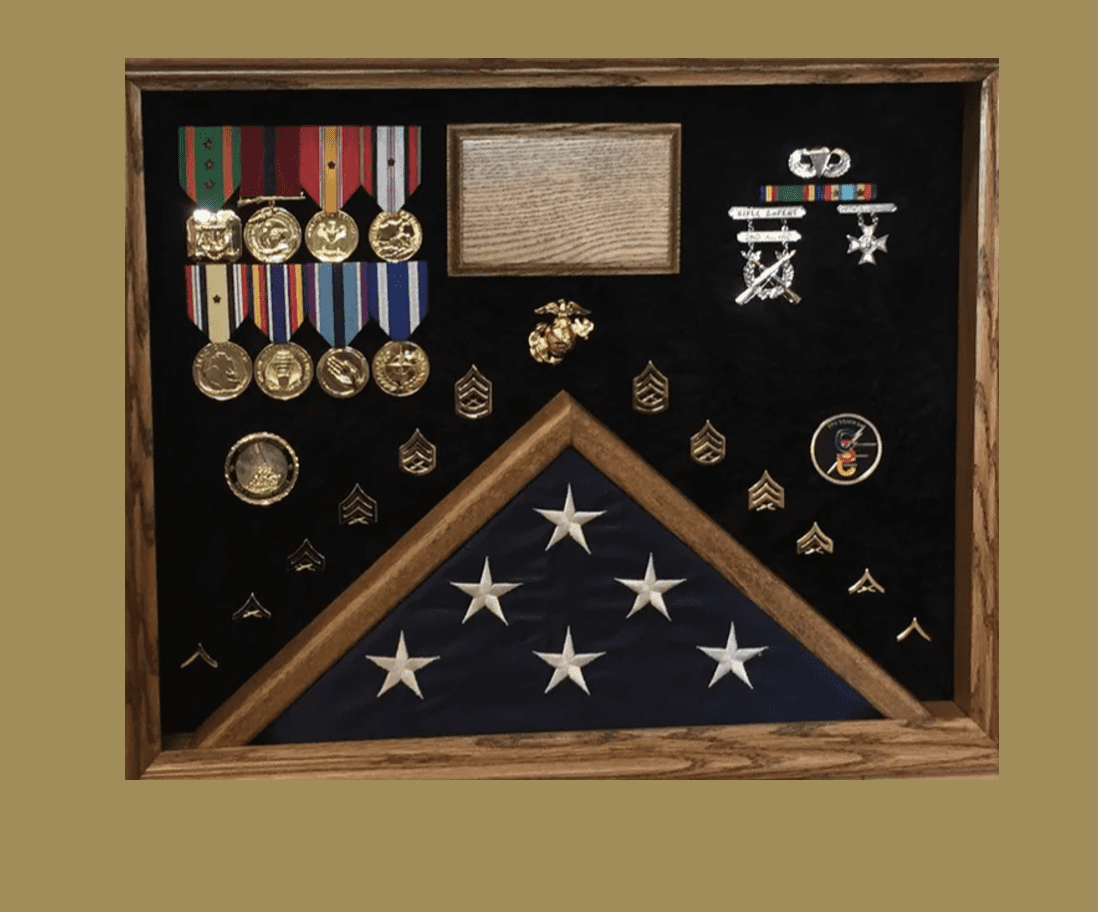 A display case with medals and a flag.