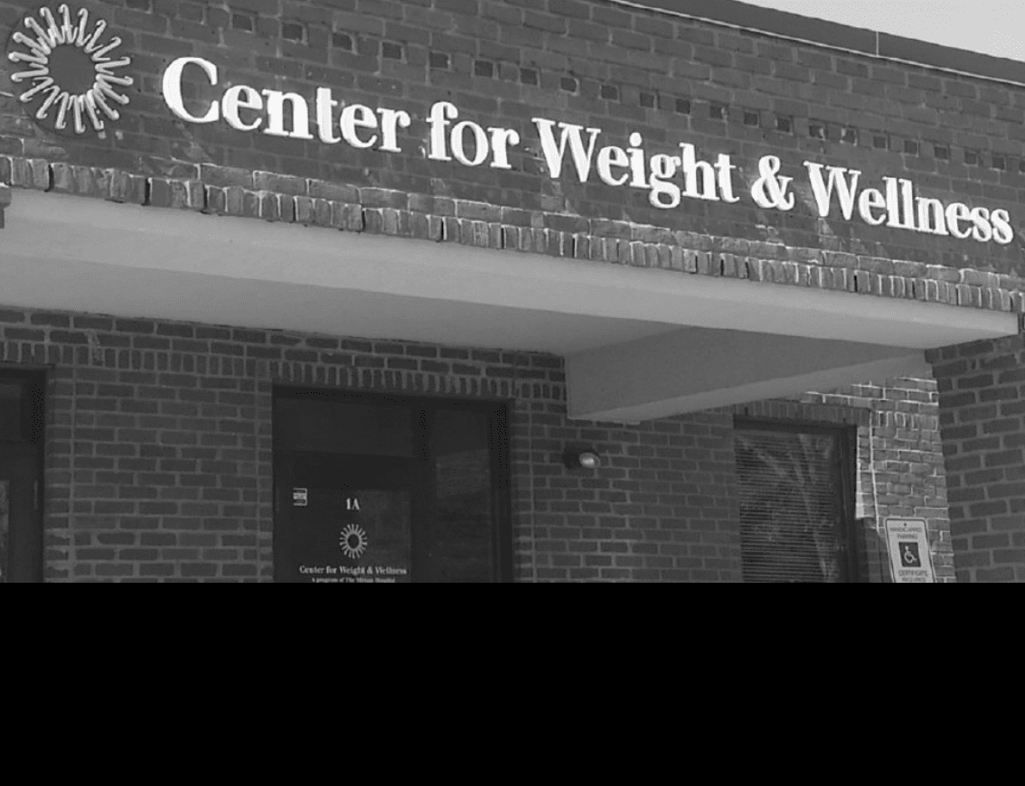 A black and white photo of the center for weight and wellness.