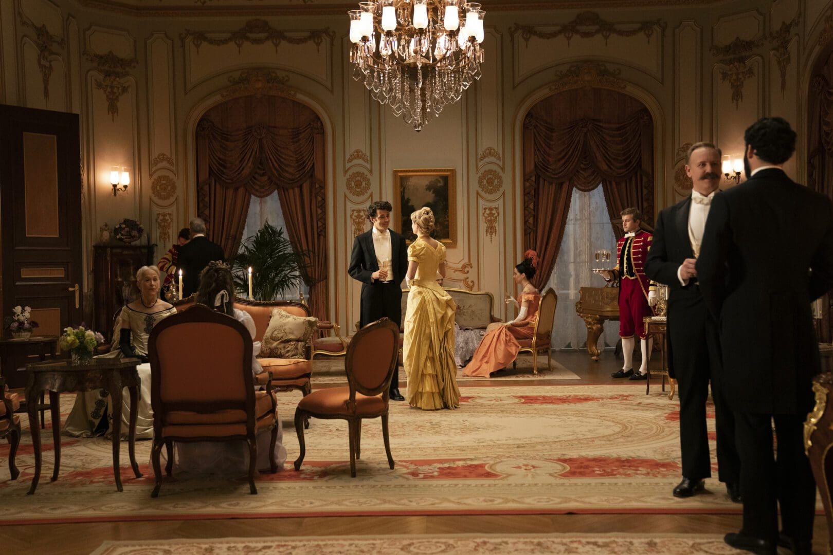 Harry Richardson and Louisa Jacobson, center, in a scene from Julian Fellowes' "The Gilded Age," Season 1, Episode 1.