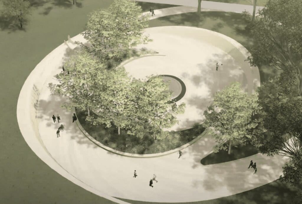 An aerial view of a circular park with people walking around it.