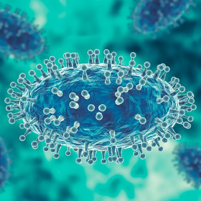 An image of a coronavirus on a blue background.