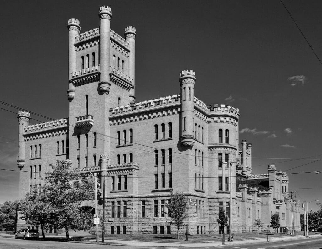A black and white photo of an ornate building.