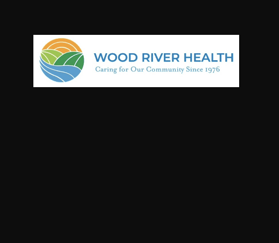 Wood river health logo on a black background.