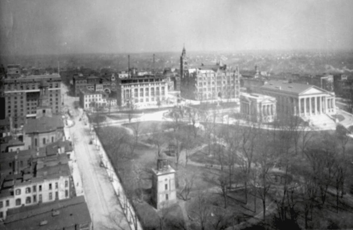 An old black and white photo of a city.