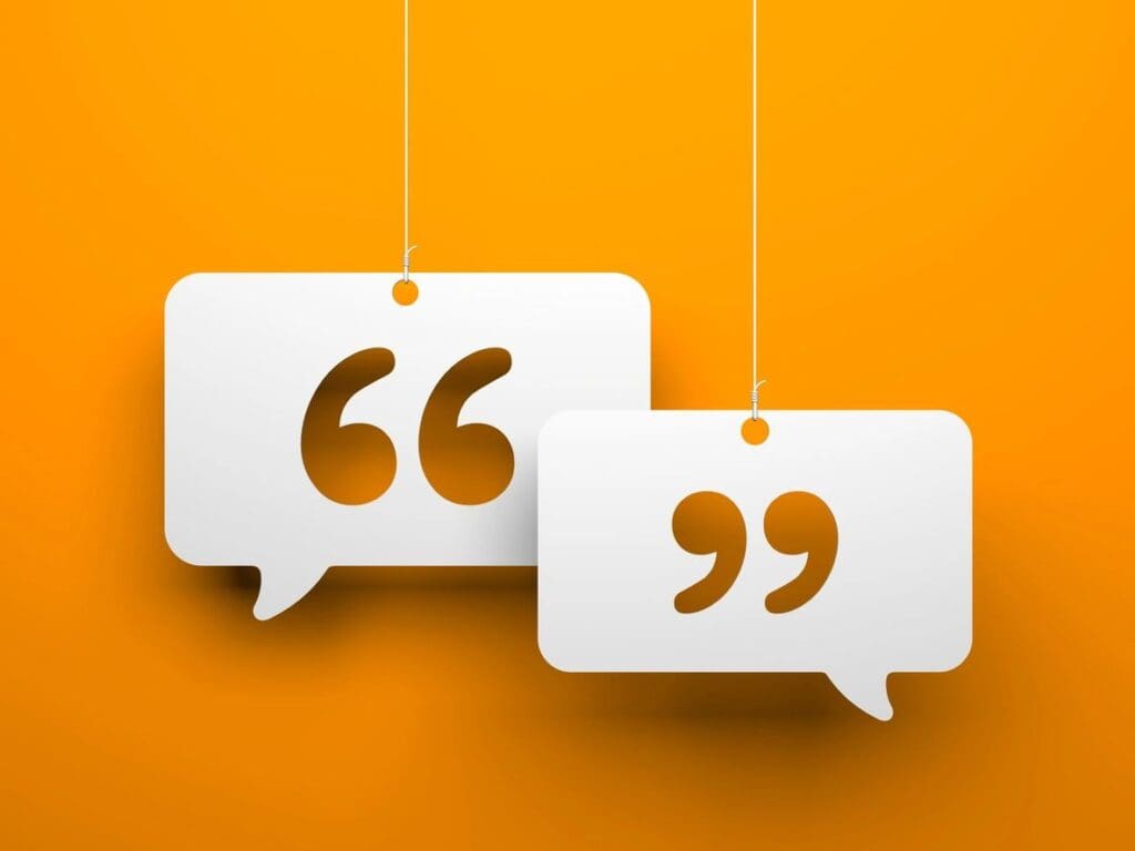 Two speech bubbles hanging on an orange background.