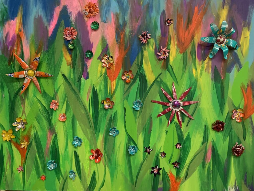 A painting of colorful flowers in a field.