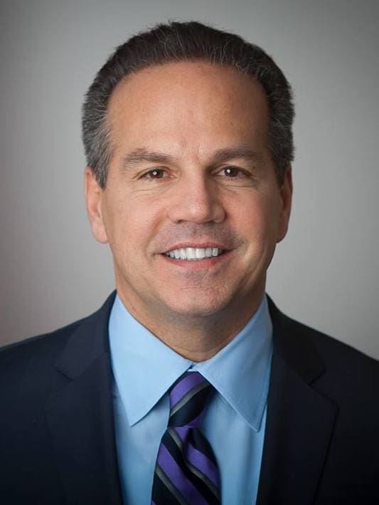 A man in a suit and tie smiling, Rep. Cicilline to become head of the Rhode Island Foundation.