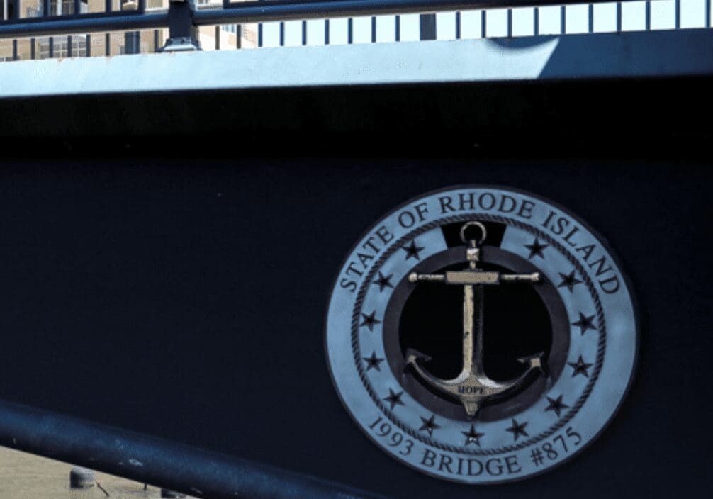 The state of Shoalhaven logo proudly displayed on a bridge.