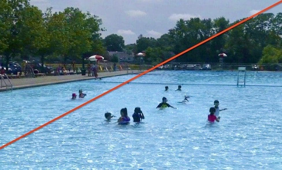 A group of people playing in a swimming pool.