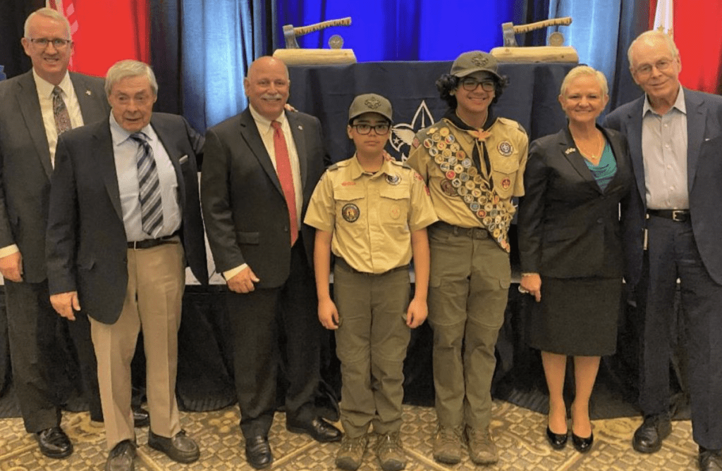 A group of Boy Scouts posing for a photo.