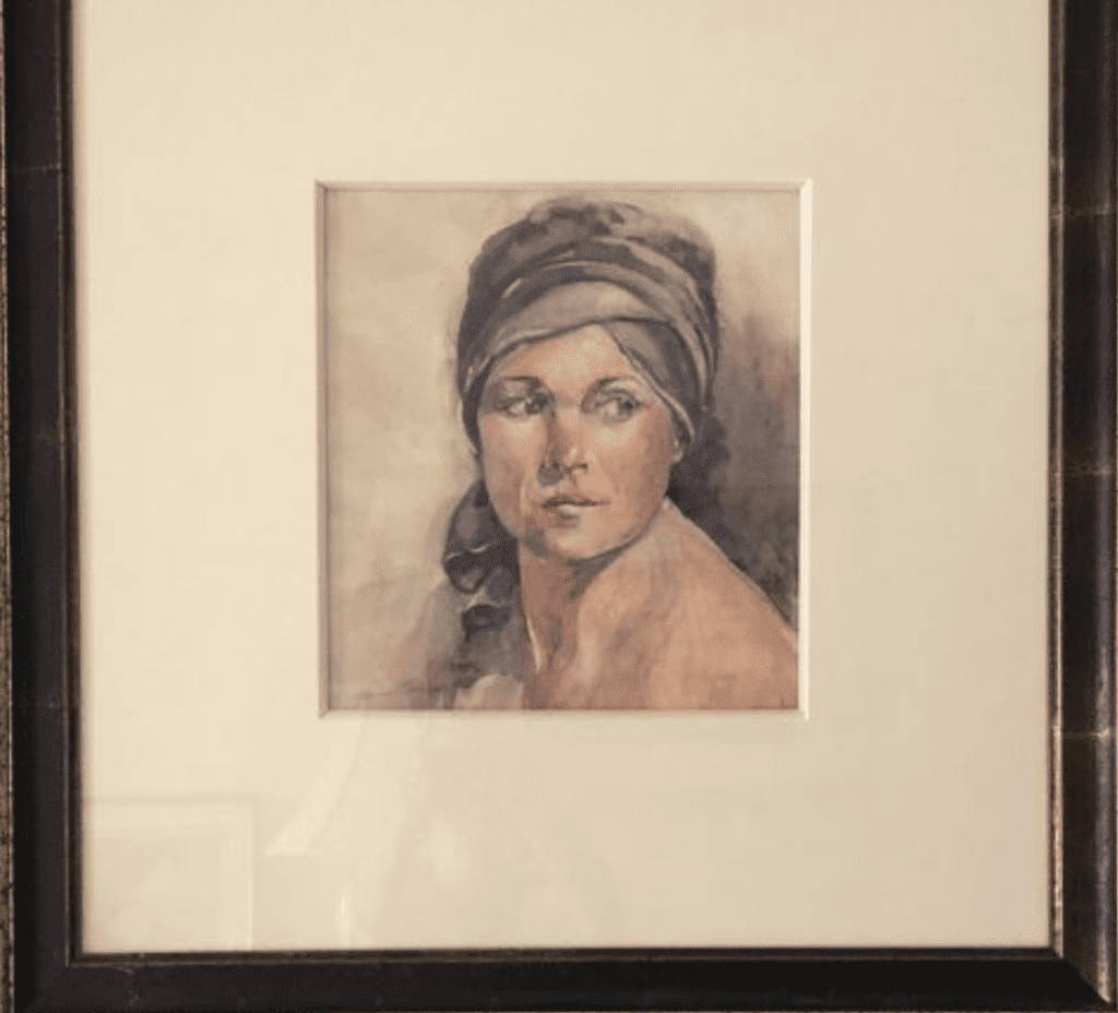 A portrait of a woman in a framed frame.