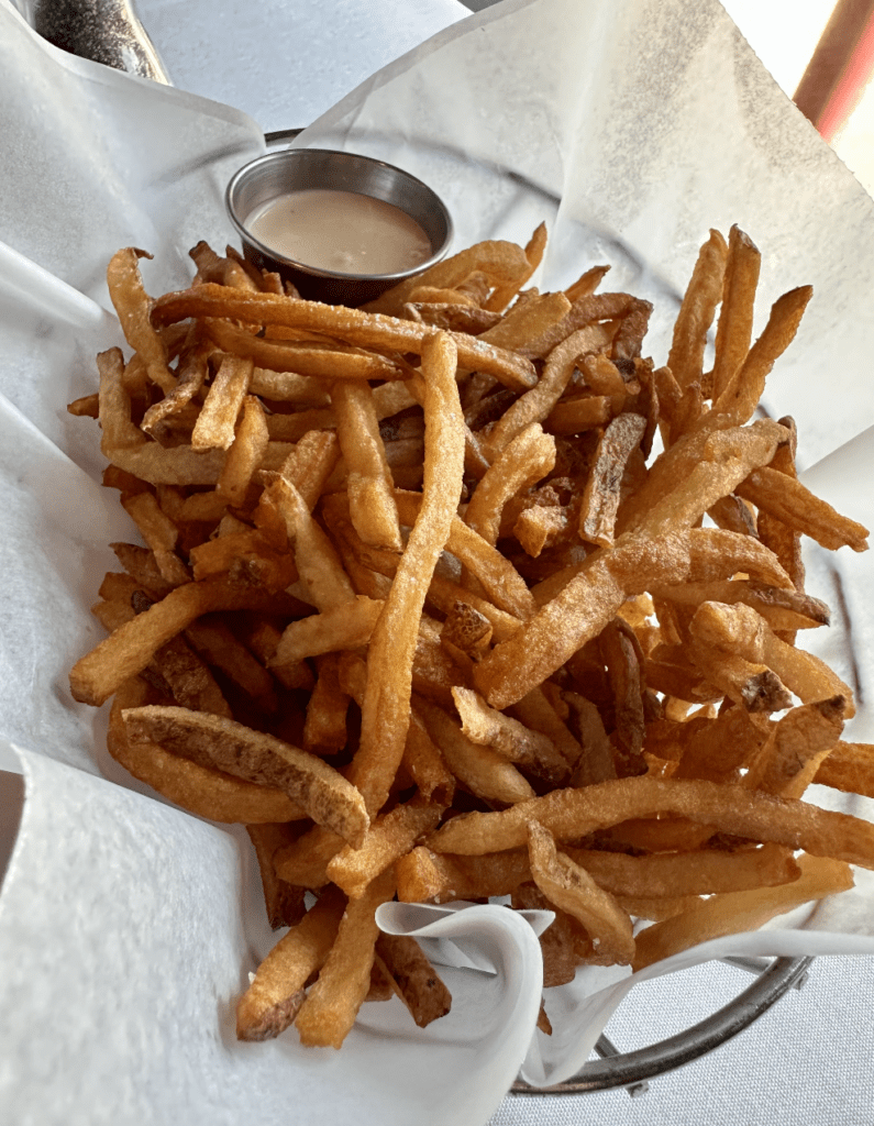 Recipe: A plate of french fries with a flavorful dipping sauce.