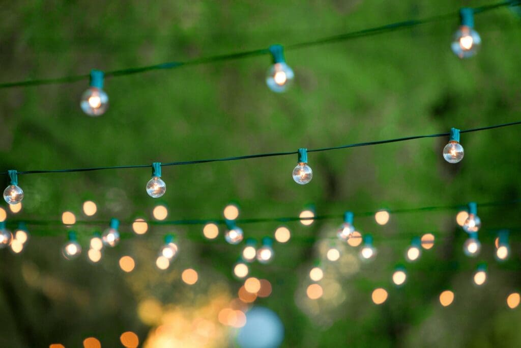 A string of lights with green and blue lights.