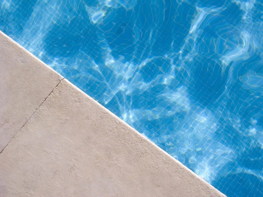 Blue water in a swimming pool.