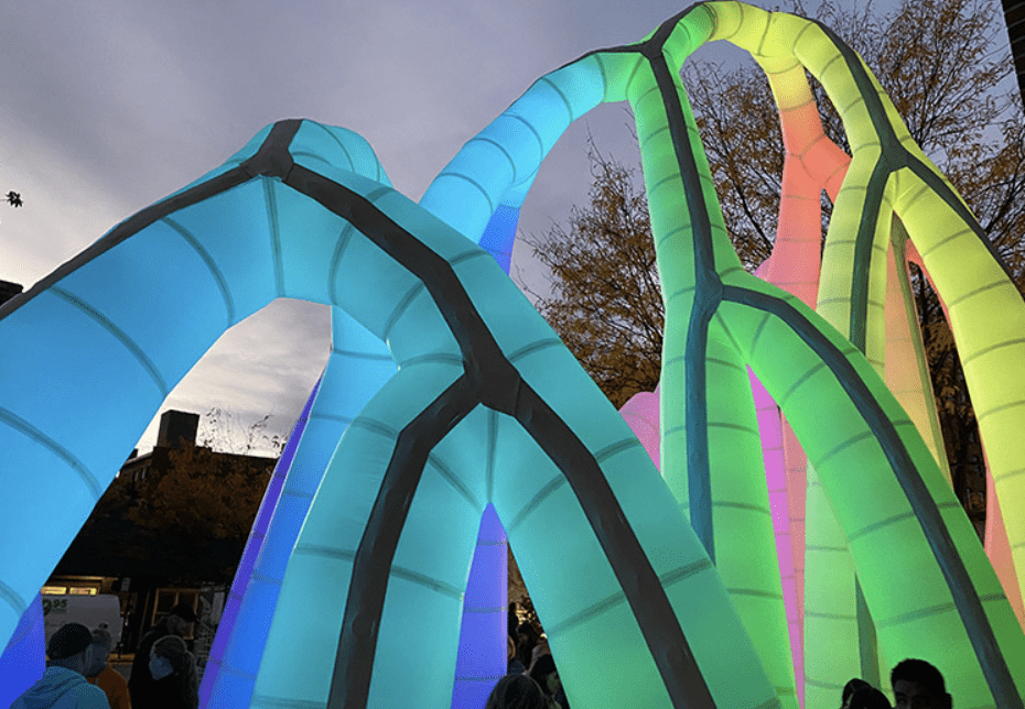 A mesmerizing illuminated sculpture at the heart of PVD Fest, a vibrant city celebration.