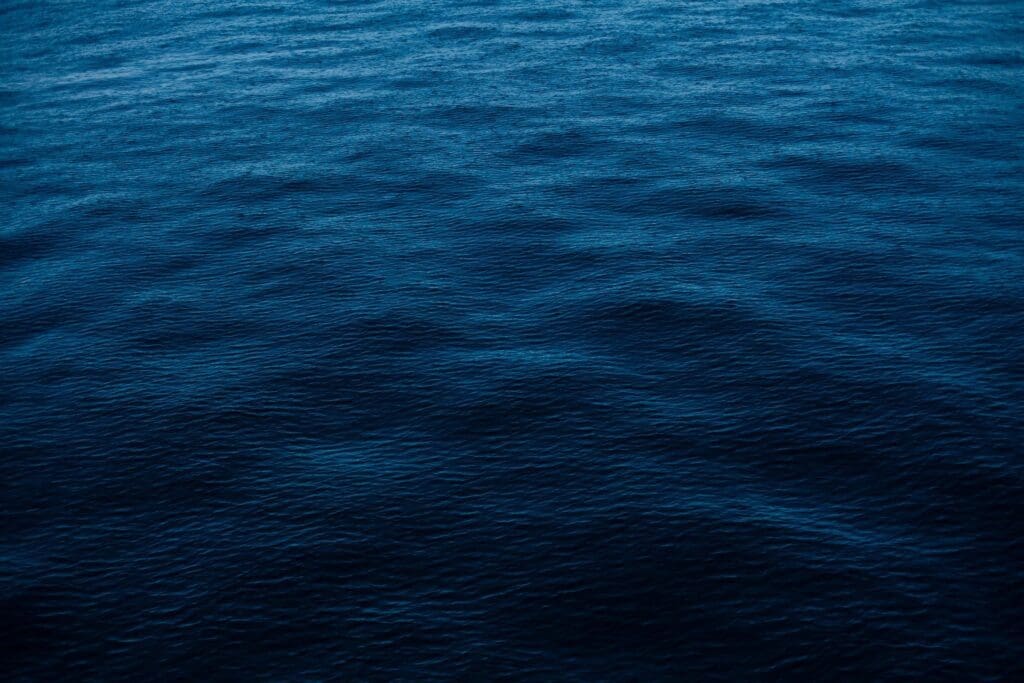 An image of a blue ocean with waves.