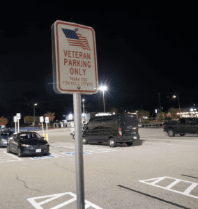 A parking lot at night.
