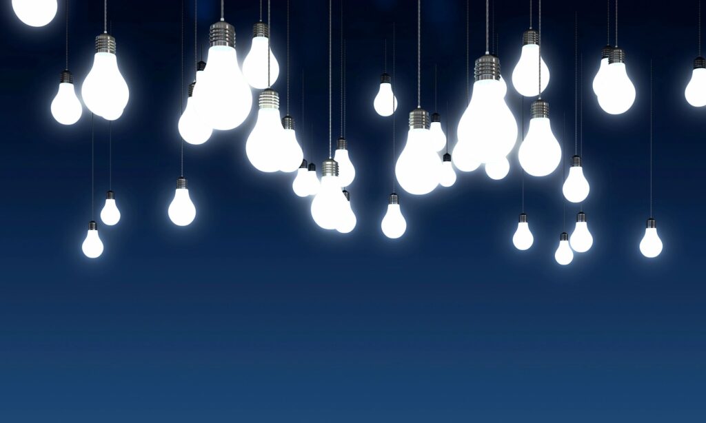 A group of light bulbs hanging from the ceiling.