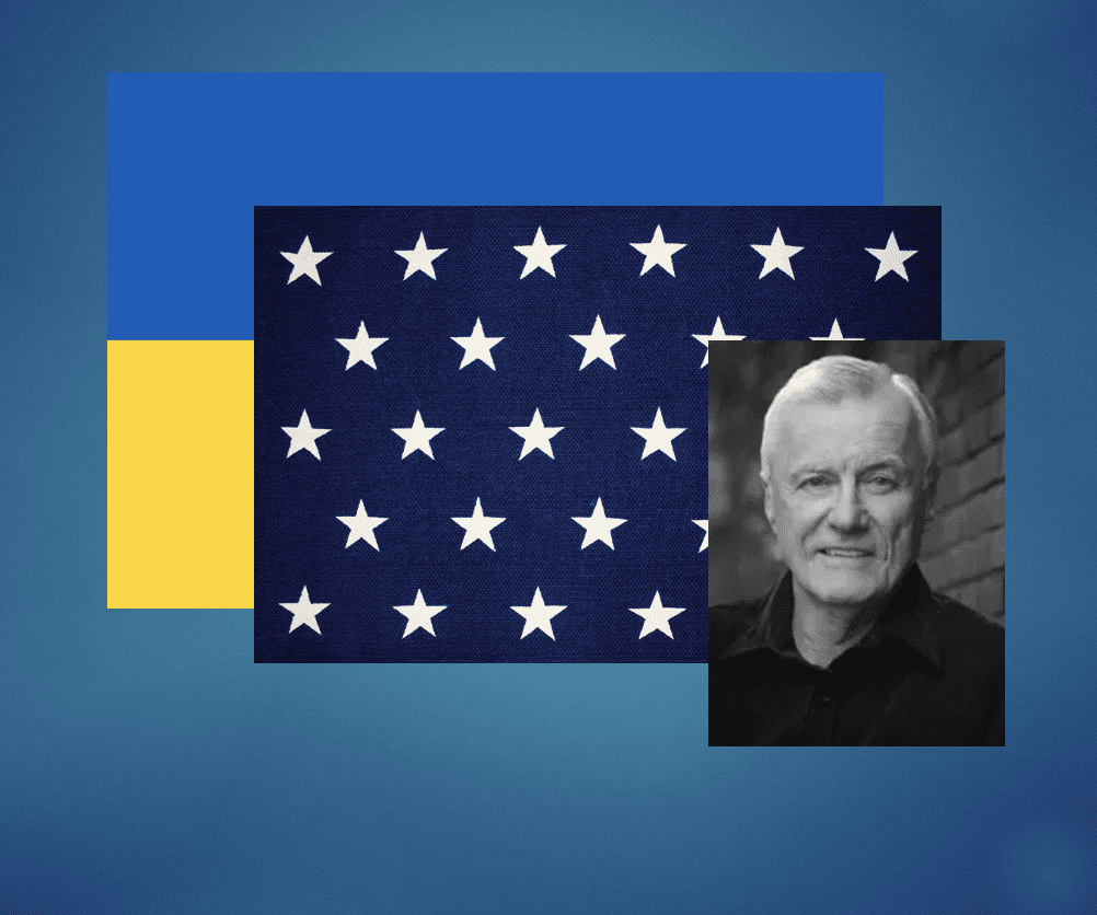 A photo of a man with a Ukrainian flag.