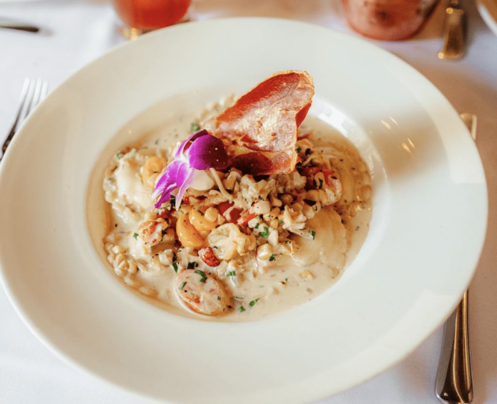 Creamy pasta dish with seafood and prosciutto.