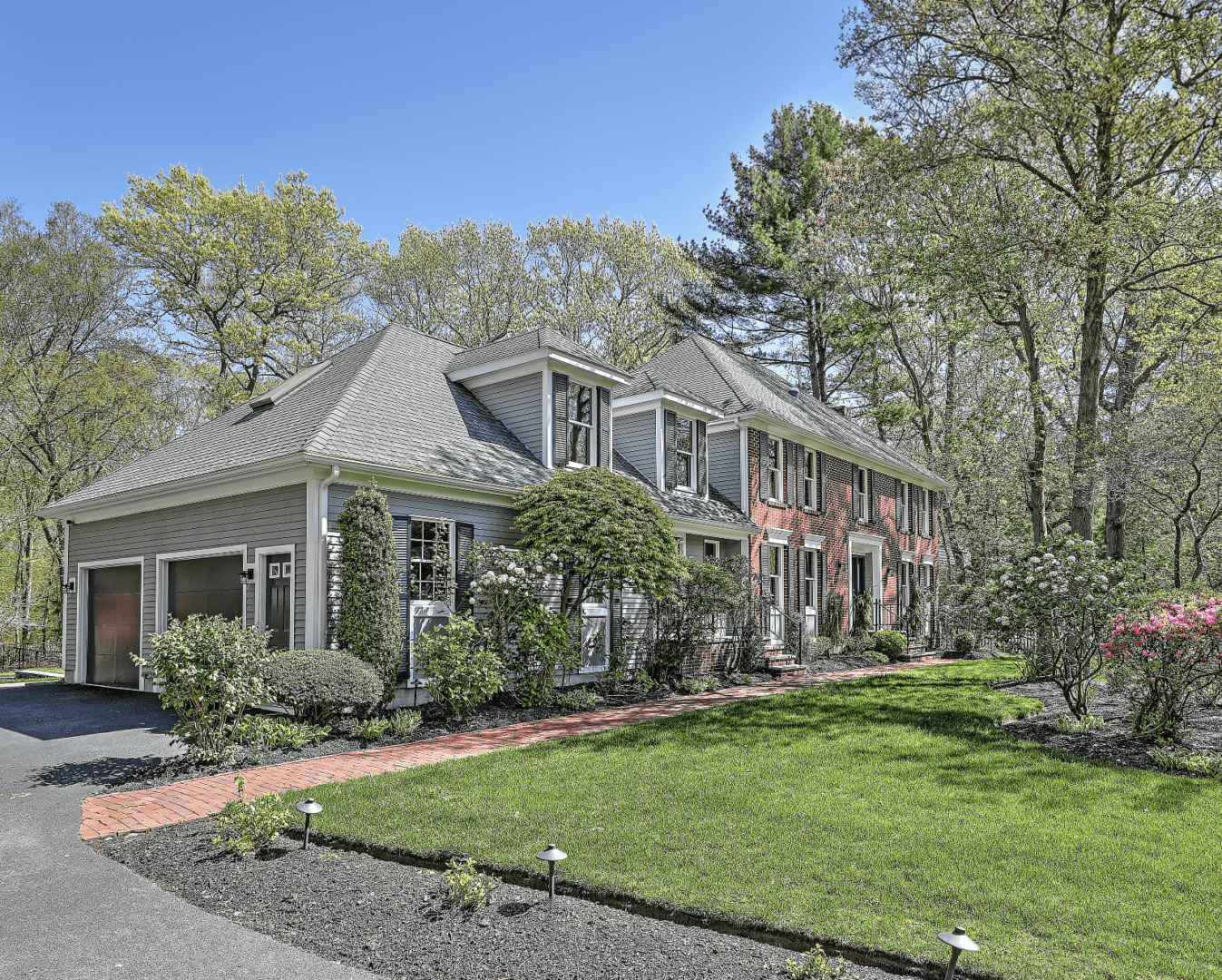 Spacious two-toned house with attached garage.