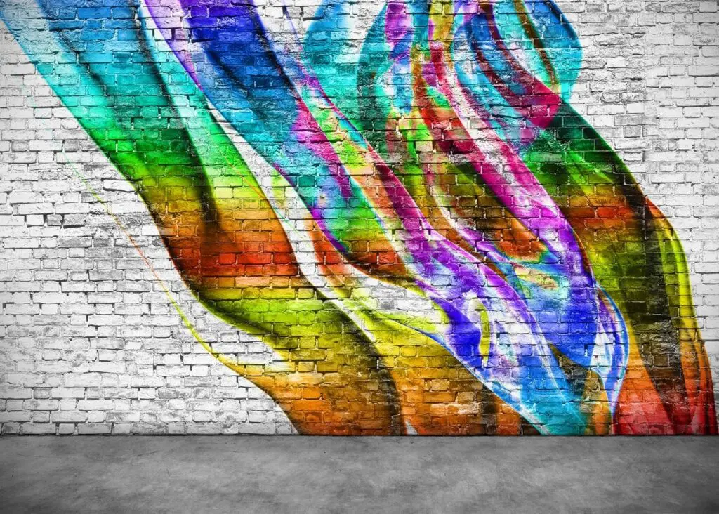 Colorful graffiti on brick wall.