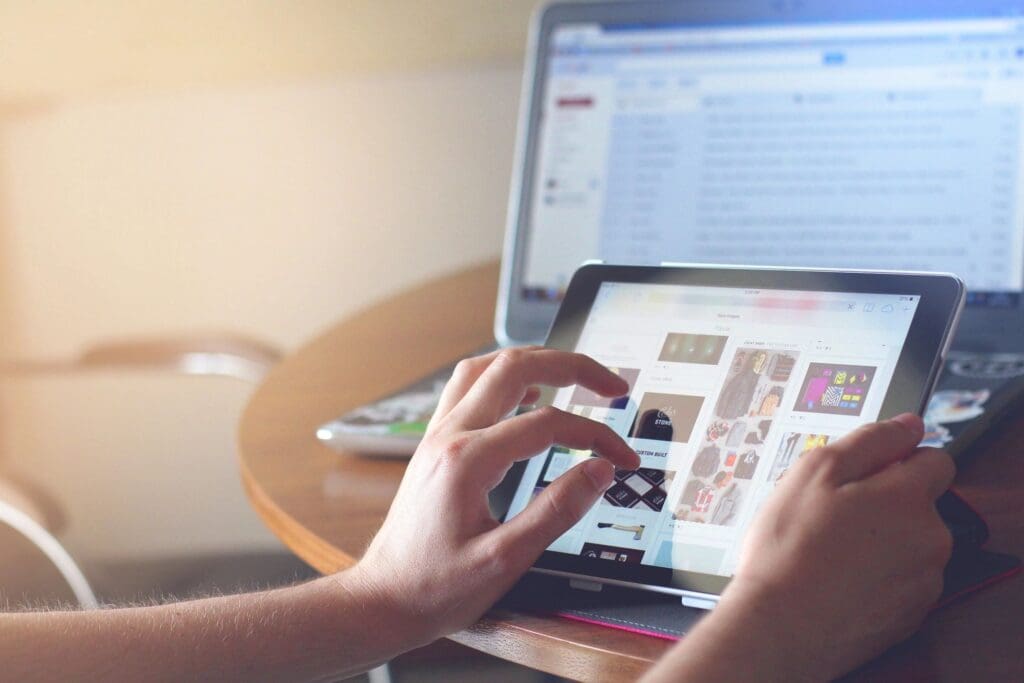 Person using tablet to shop online.