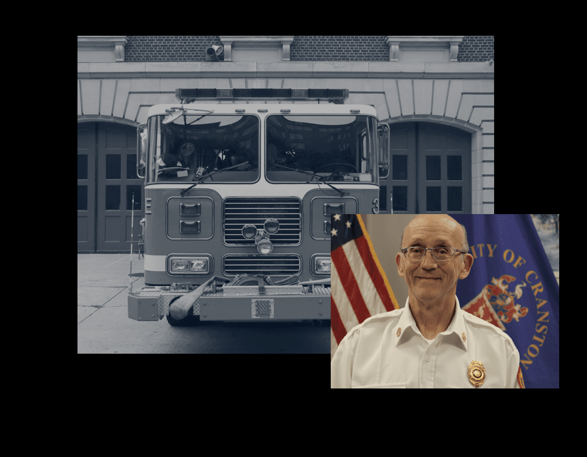 A picture of an old fire truck and a man in front of it.