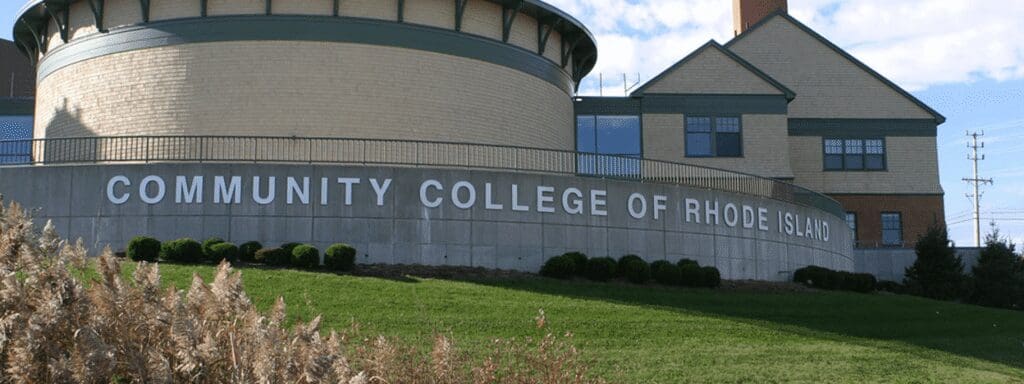 Building exterior of a community college with clear signage.