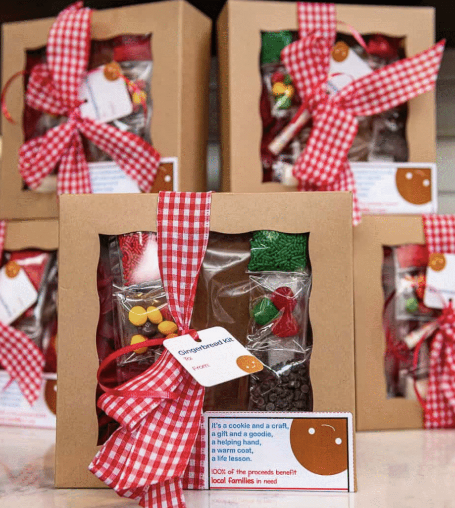 Gift boxes with festive red and white checkered ribbons on a wooden table.
