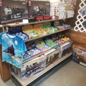 Display of various colorful Pokémon merchandise and toys in a store.