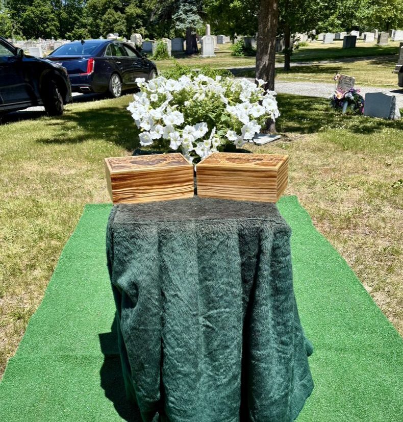Burial service for Irina and Stanislaw Kozak at North Burial Ground in Providence.
