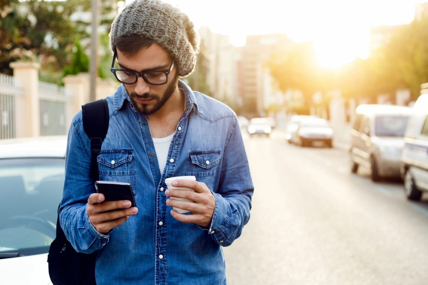 man on cell phone while traveling