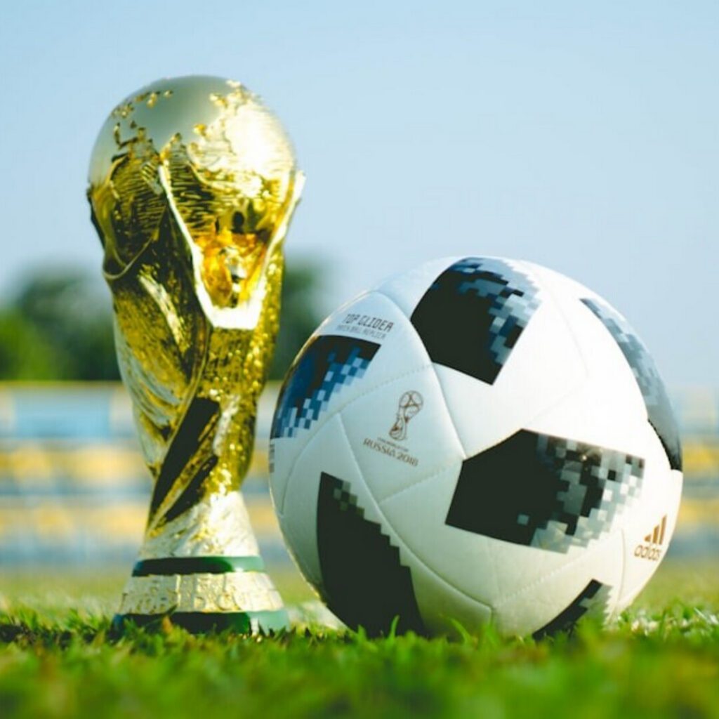 world cup trophy and soccer ball