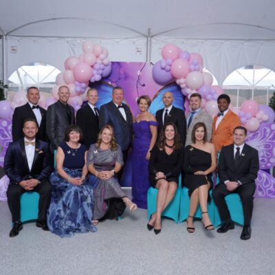 Gala attendees pose for group photo.