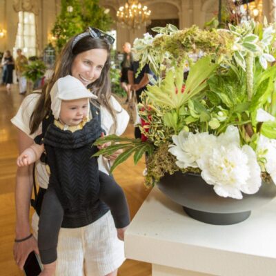 A woman holding a baby.