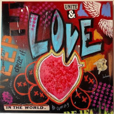 A piece of art with the words love in the world.