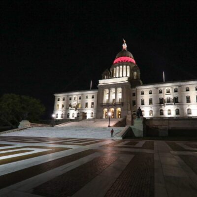 A large building lit up at night.