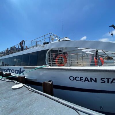 The ocean state ferry docked at the dock.