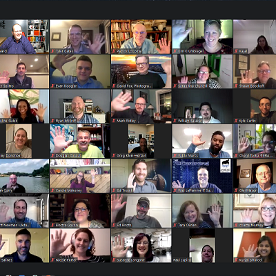 A screen shot of a group of people in a video conference.