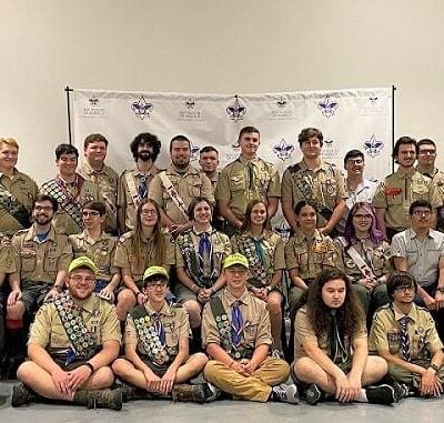 A group of scouts posing for a photo.
