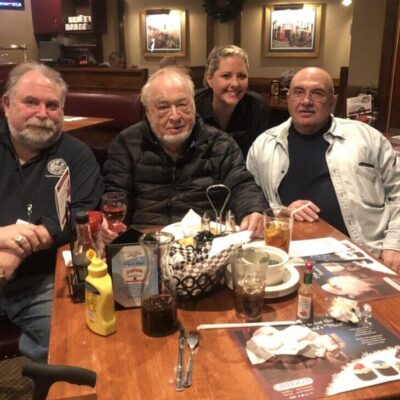 Group dining at a restaurant table together.