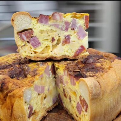 Savory meat and cheese quiche slices.