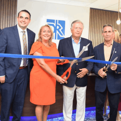 Ribbon cutting ceremony at DR office.