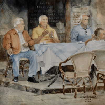 A group of men sitting at a table.