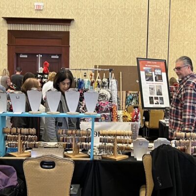 Shoppers in Rhode Island gathered around a table full of items.